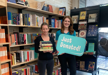 GIVIT Engagement Officer Breanna with a female staff member from Book Warehouse Lismore