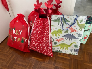 Wrapped kid's Christmas presents ready for Christmas Day.