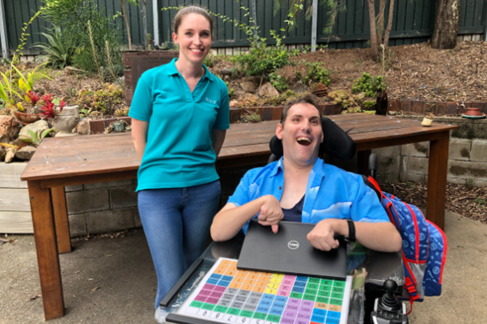 Engagement Officer Danni (standing female) and BJ (seated in a wheelchair, male) at CPL Ashgrove holding his donated laptopEngagement Officer Danni (standing female) and BJ (seated in a wheelchair, male) at CPL Ashgrove holding his donated laptop